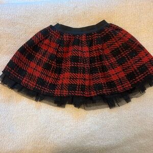 Girls red and black plaid skirt size 7/8